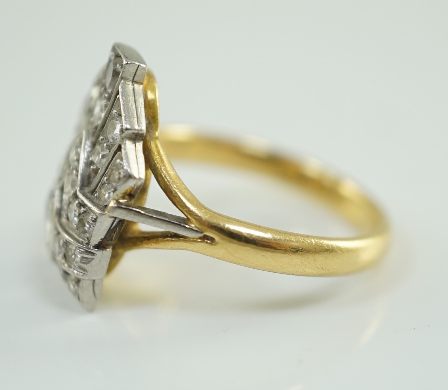 An 18ct gold, platinum and diamond cluster set coronet ring